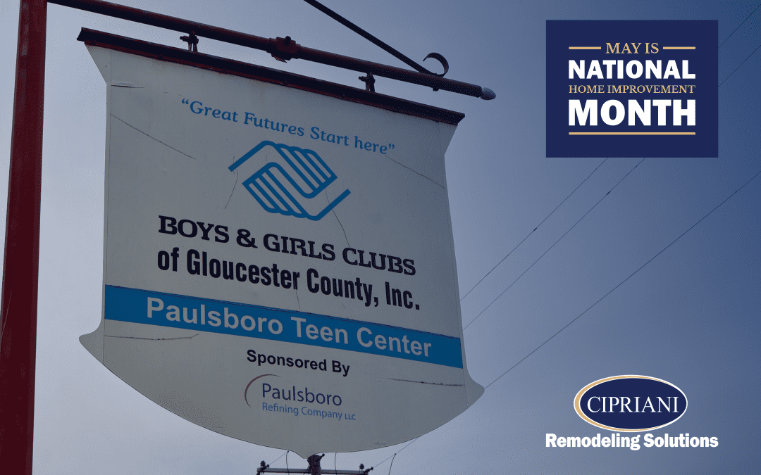 Sign of Boys & Girls Clubs of Gloucester County, Inc., Paulsboro Teen Center, sponsored by Paulsboro Refining Company LLC. The sign includes the Boys & Girls Clubs logo and the phrase, "Great Futures Start Here." On the right side is a graphic that reads, "May is National Home Improvement Month," alongside the Cipriani Remodeling Solutions logo.