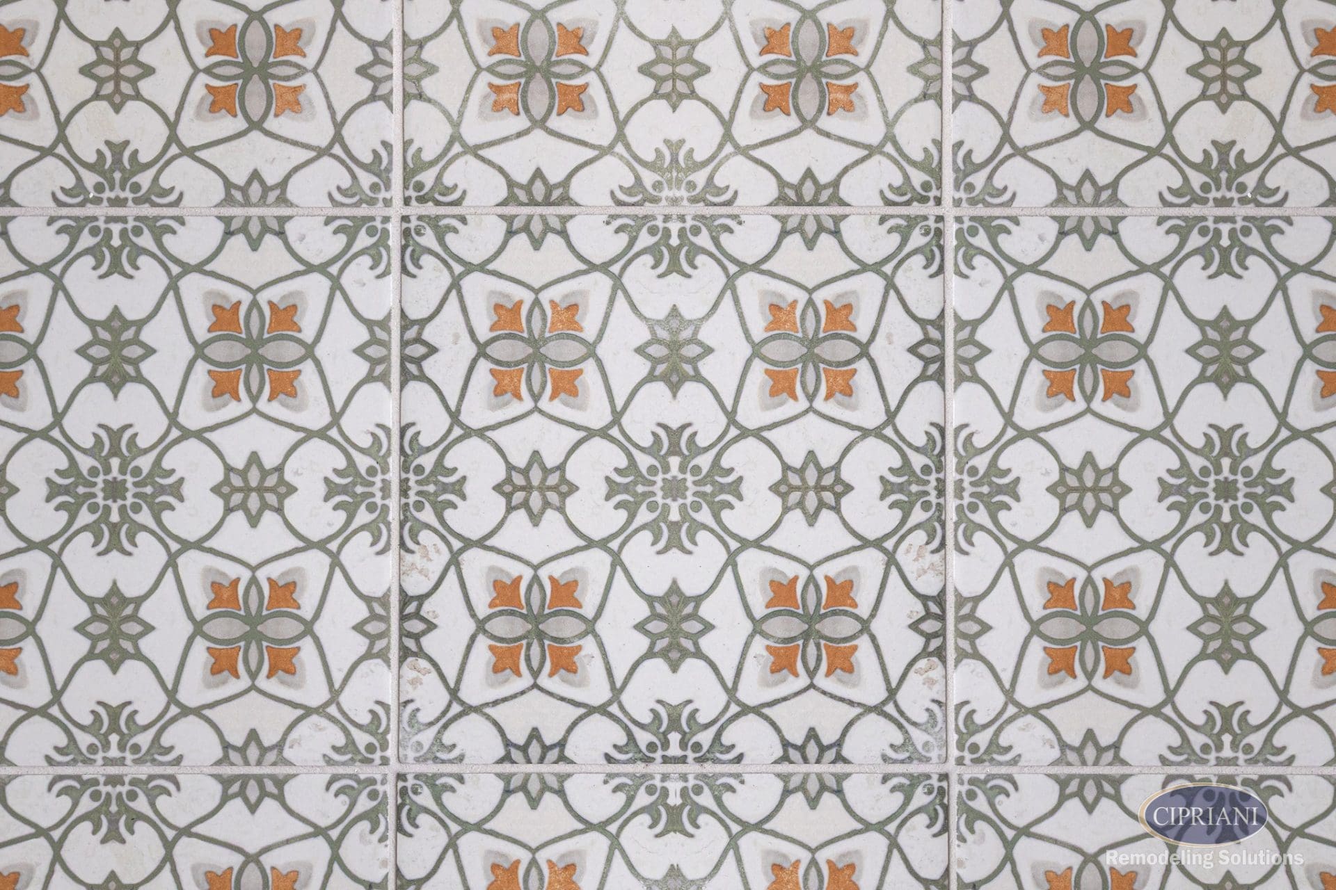 Patterned bathroom floor tile with floral and geometric design