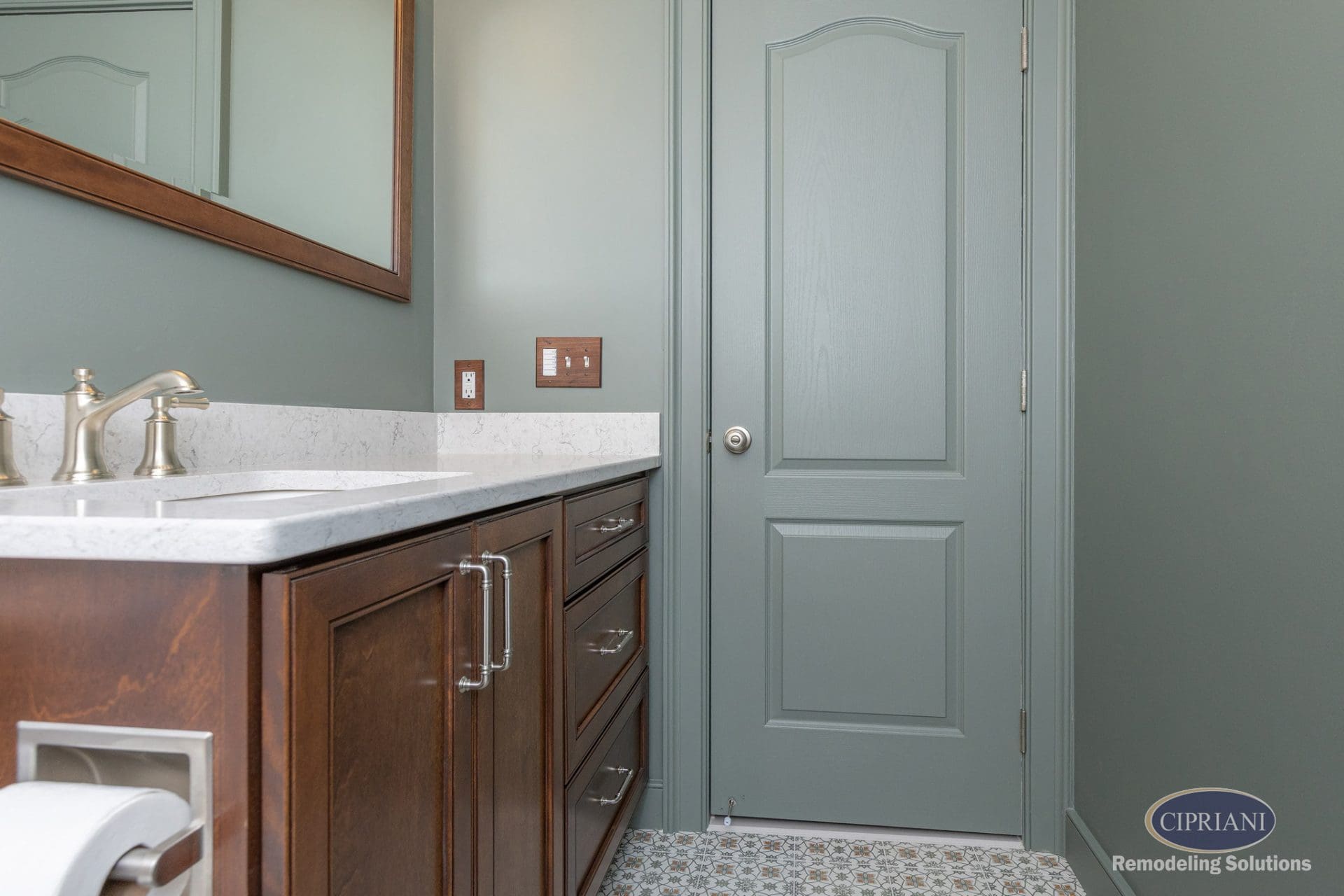Painted door and vanity detail in remodeled bathroom