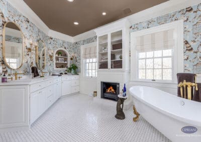 Luxury freestanding tub, double vanity, and fireplace in Mullica Hill bathroom remodel