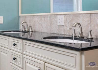 Double sink vanity with black countertop in Wenonah NJ bathroom remodel