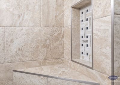 Shower bench and recessed niche with mosaic tile in Wenonah NJ bathroom remodel