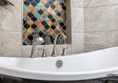 Freestanding bathtub with handheld faucet and accent tile niche in Wenonah NJ bathroom remodel