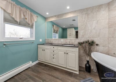 Double vanity with large mirror and freestanding tub in Wenonah NJ bathroom remodel